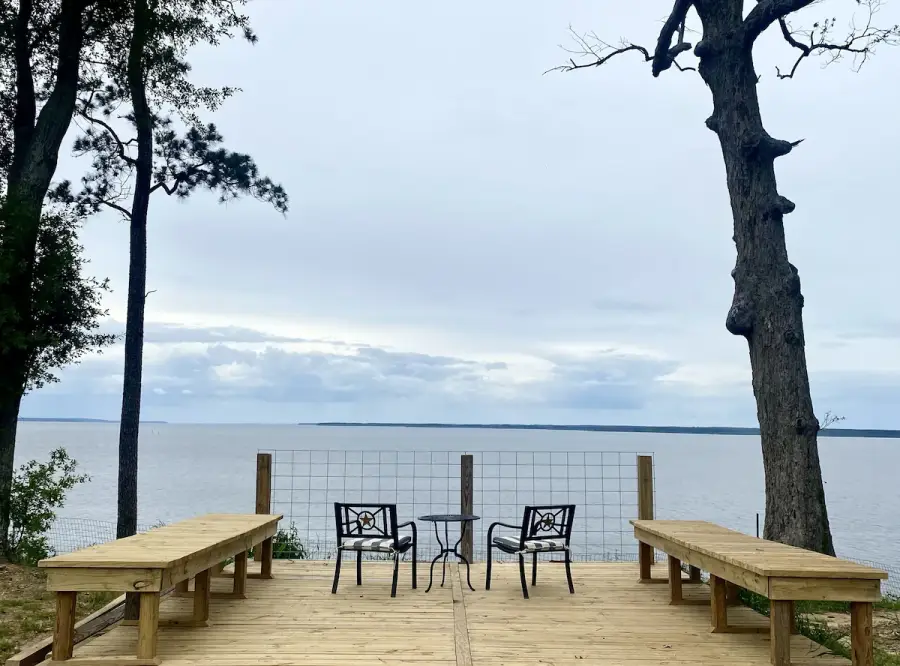 Relax and enjoy the panoramic view from the deck overlooking the lake. Relax and enjoy the panoramic view from the deck overlooking the lake.